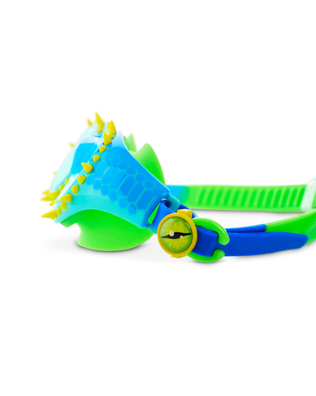 close-up of Jurassic Dive Kids Swim Goggles in stego splash showing silicone spikes, a reptilian printed frame and eyeball strap sliders