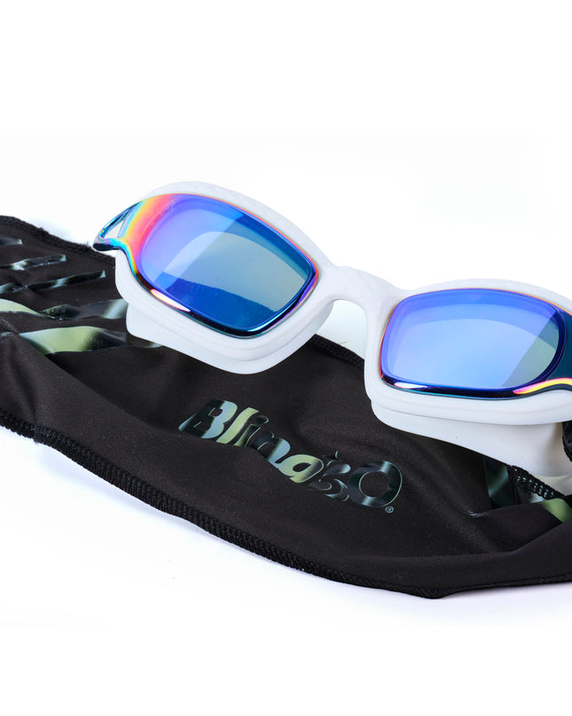 styled shot of Softline Swim Goggles in puff showing textured frame, mirrored lens, and soft strap