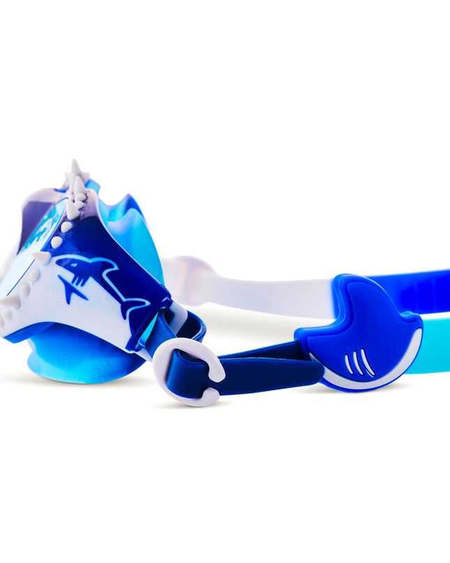 close-up view of Shark Surge Kids Swim Goggles in great white strike showing silicone spikes, shark fin slider and a shark illustration on the frame