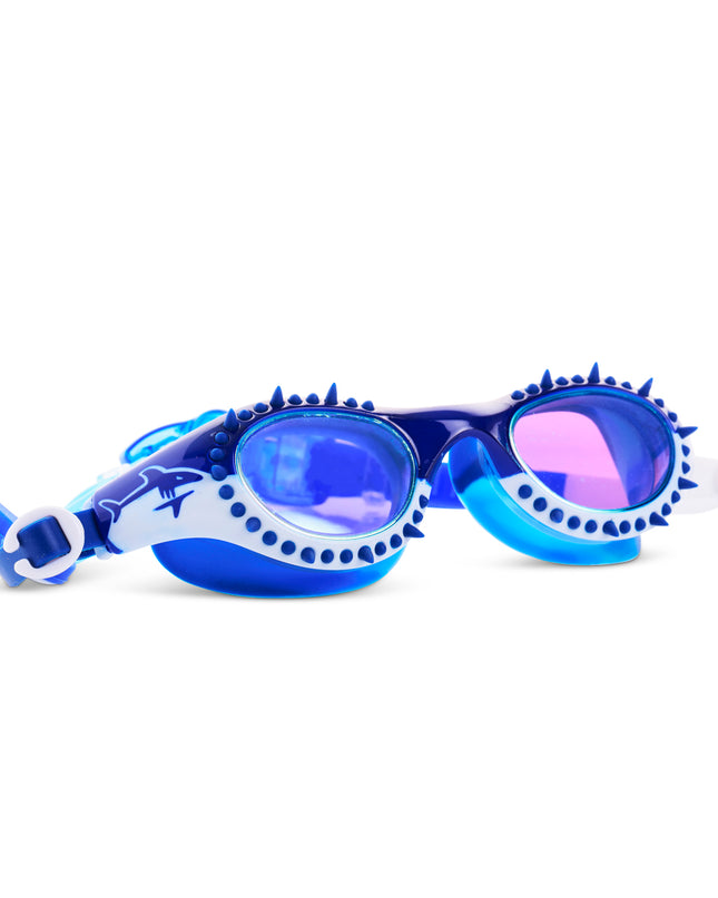 angled view of Shark Surge Kids Swim Goggles in lagoon bite showing silicone spikes and a shark illustration on the frame