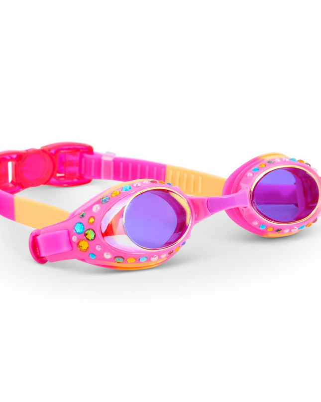 angled view of glimmering gemstones kids' swim goggles in tropical tanzanite showing rhinestones and gems on a bright pink swim goggle frame