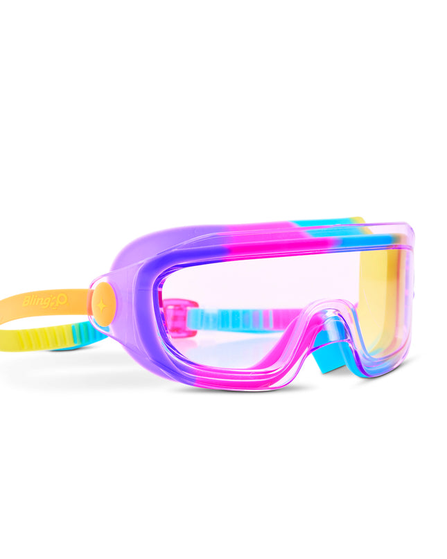 angled view of Hologlow Kid's Swim Goggles in Hyper Rainbow showing a wide frameless lens with purple, pink, blue and yellow silicone gasket
