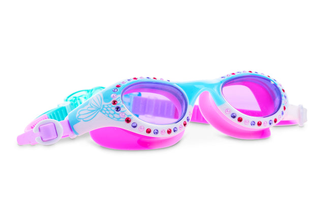 angled view of neptune's pearl kids swim goggles in seafoam siren showing mermaid tail illustration on frame and rhinestones