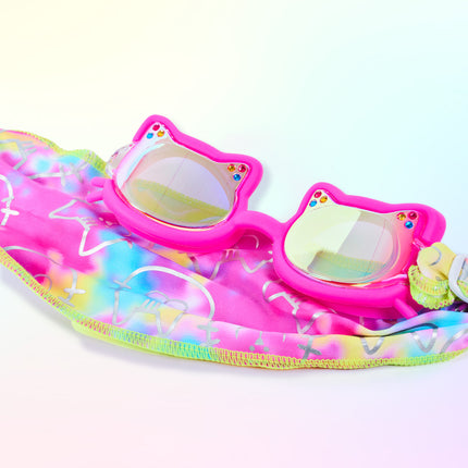 Close-up glam shot of Soft Paws Fuzzy Pink goggles styled on matching pastel tie-dye soft strap, highlighting mirrored lenses, rhinestones, cat frame shape, and easy-on soft strap
