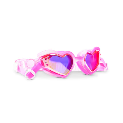 Angled view of Swirl Me Up Pink Drink swim goggles featuring glossy pink frame and mirrored heart lenses