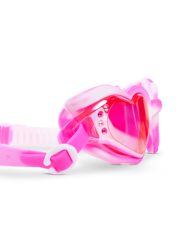 Close-up glam shot of Swirl Me Up Pink Drink goggles highlighting iridescent lenses and rhinestone details