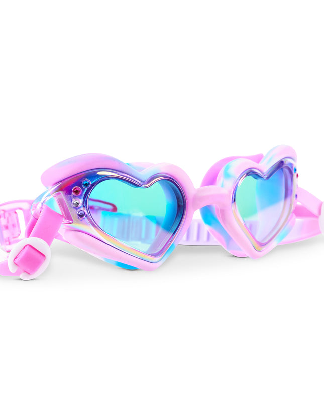 Angled view of Swirl Me Up Radberry Twist swim goggles featuring colorful swirl frame and mirrored heart lenses