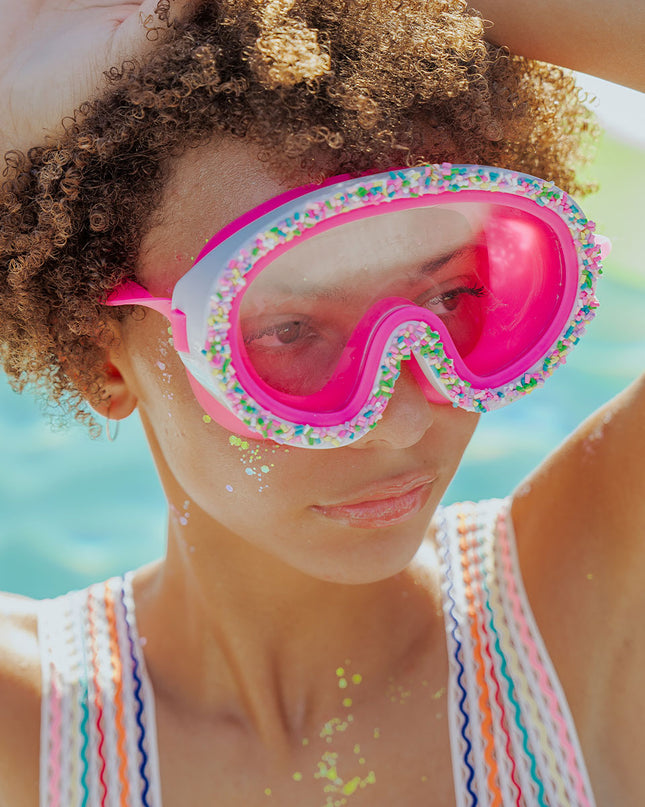 baked with love kids swim mask in pink pareils lifestyle girl wearing swim mask poolside