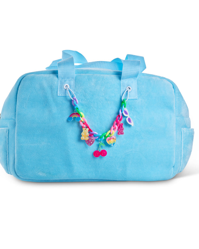 Blue Crush Velour Tote showing rainbow chain link with charms. charms are rainbow charm, gummy bear charm, cherry charm, heart charm, and sunglass charm on rainbow chain link