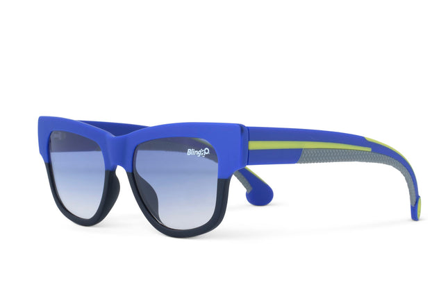 angled view fire island kids' sunglasses in royal sun rays showing wayfarer shaped sunglass frame in a royal blue and black colorway