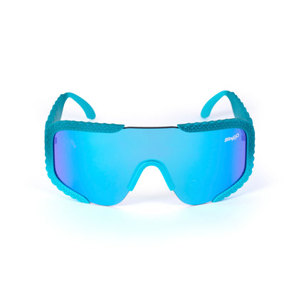 product shot of gulf shore kids' sunglasses in siesta sea featuring a vibrant blue color and crocodile-inspired texture and shield lens