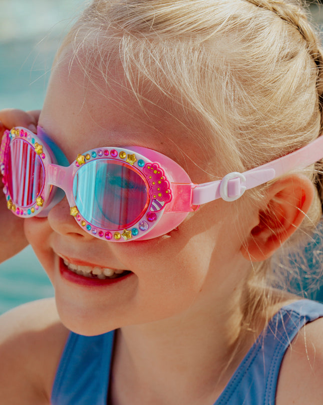 lifestyle image of girl smiling wearing candy carnival showing rhinestones and cotton candy detail
