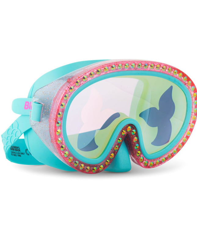 angled view of blue sea kids' swim mask with nose piece in blue sushi colorway showing reflective translucent mermaid tail print lens on rhinestone glitter frame