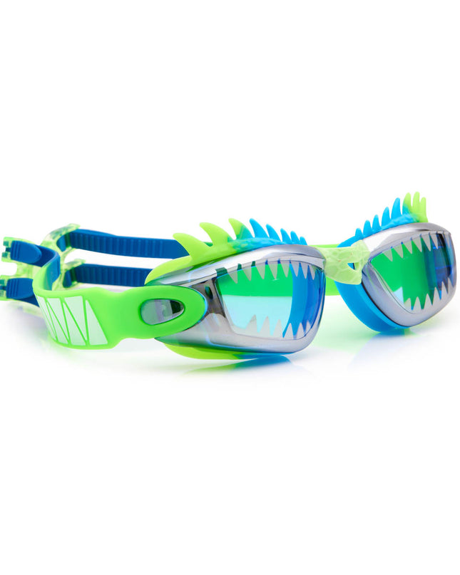 angled view of draco the dragon kids' swim goggles in sea dragon green showing silicone spiked gasket and sharp teeth printed lens