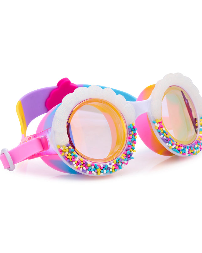 angled view of bake off kids' round shaped swim goggles in color burst rainbow showing faux frosting detail and rainbow sprinkles