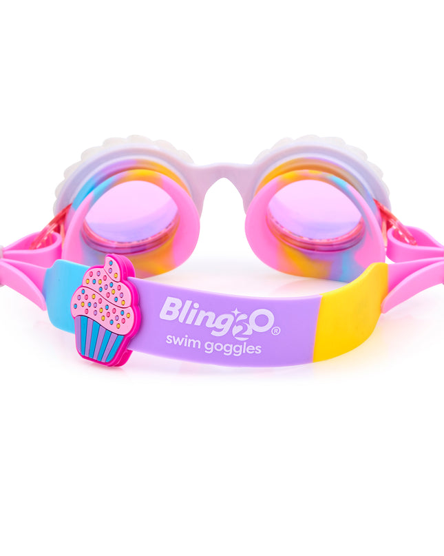 back view of bake off kids' round shaped swim goggles in color burst rainbow showing strap and cupcake silicone slider