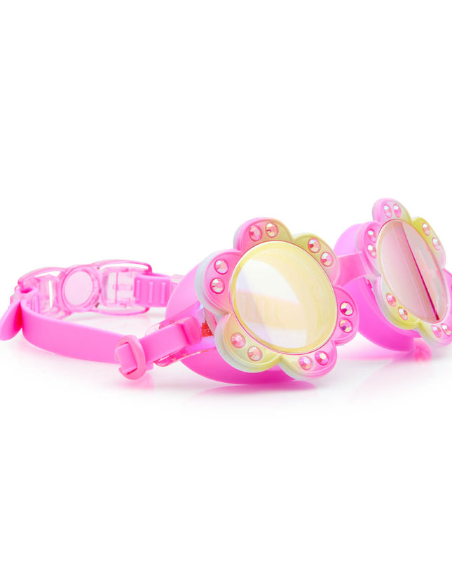 angled view of gardenia flower shaped swim goggles in golden hour showing petal details and rhinestones with mirrored lens